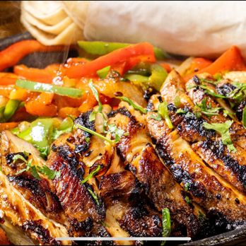 Bar Mexicana signature dishes Fajitas Carne AsadaBurrito Carne AsadaStreet Corn